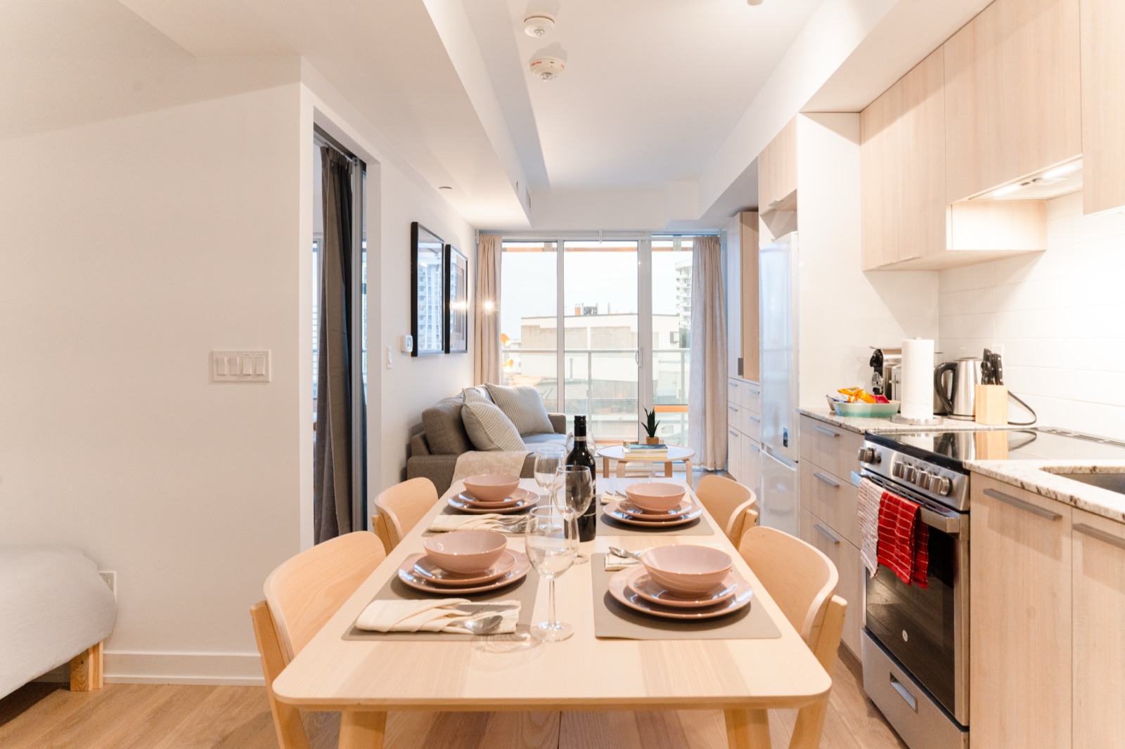 Yonge & College dining table and kitchen