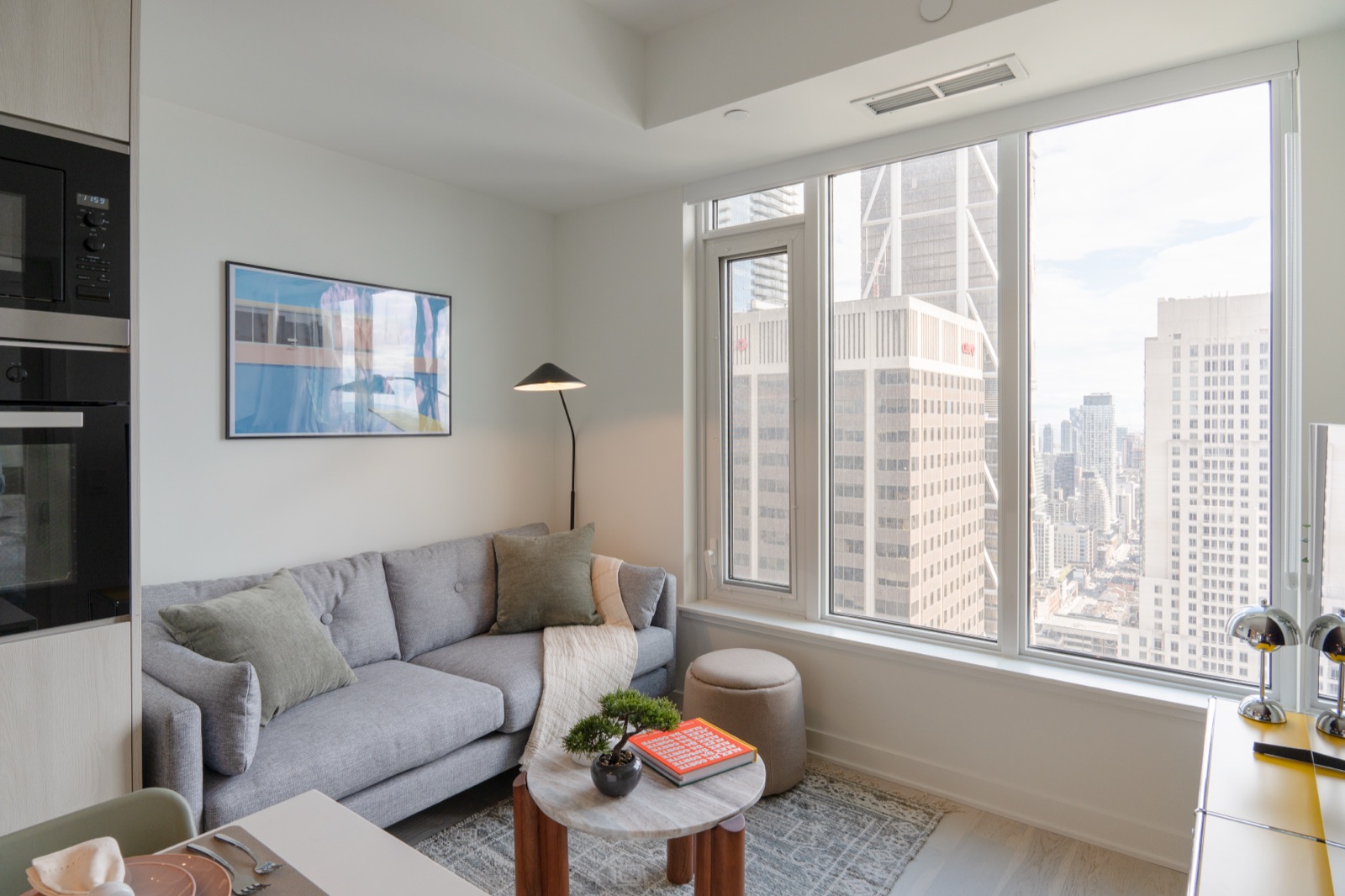 Yorkville living room with floor-to-ceiling city views